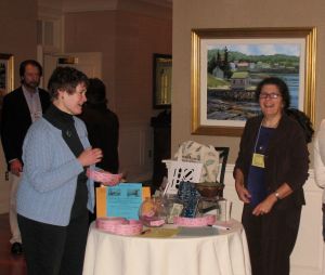 cathy melio Cathy Melio from Center for Maine Contemporary Art selling raffle tickets to Carol Deetjen from Boothbay, art teacher from Boothbay Region Elementary School
