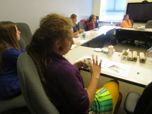 Marshwood Middle School art teacher and Teacher Leader Amy Cousins participating in Teaching Artist Randy Fein's workshop using clay.