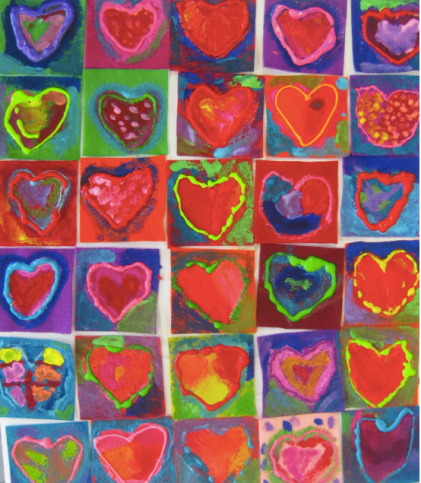 Elementary Art Teacher Cassie Stephens creates a school-wide mural. 