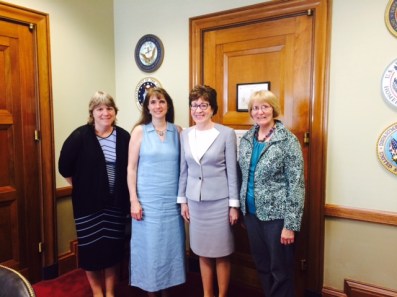 MMEA President-Elect Sue Barre, President Pamela Kinsey, Senator Collins, and Past-President Sam Moore-Young