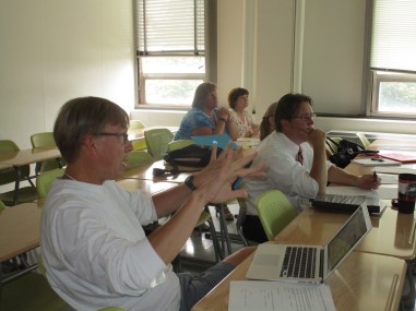 Rob Westerberg, Nancy Kinkade, Holly Leighton, (hidden) Shari Tarleton, and Virgil Bozeman provide feedback