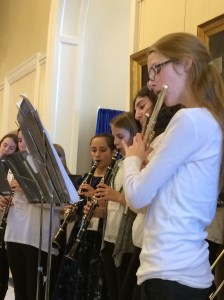 Under the direction of music teacher Cynthia Streznewski, musicians from Woolwich Central School perform at the State House for the celebration